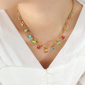Crystal charm necklace with multicolor beads on gold-tone chain