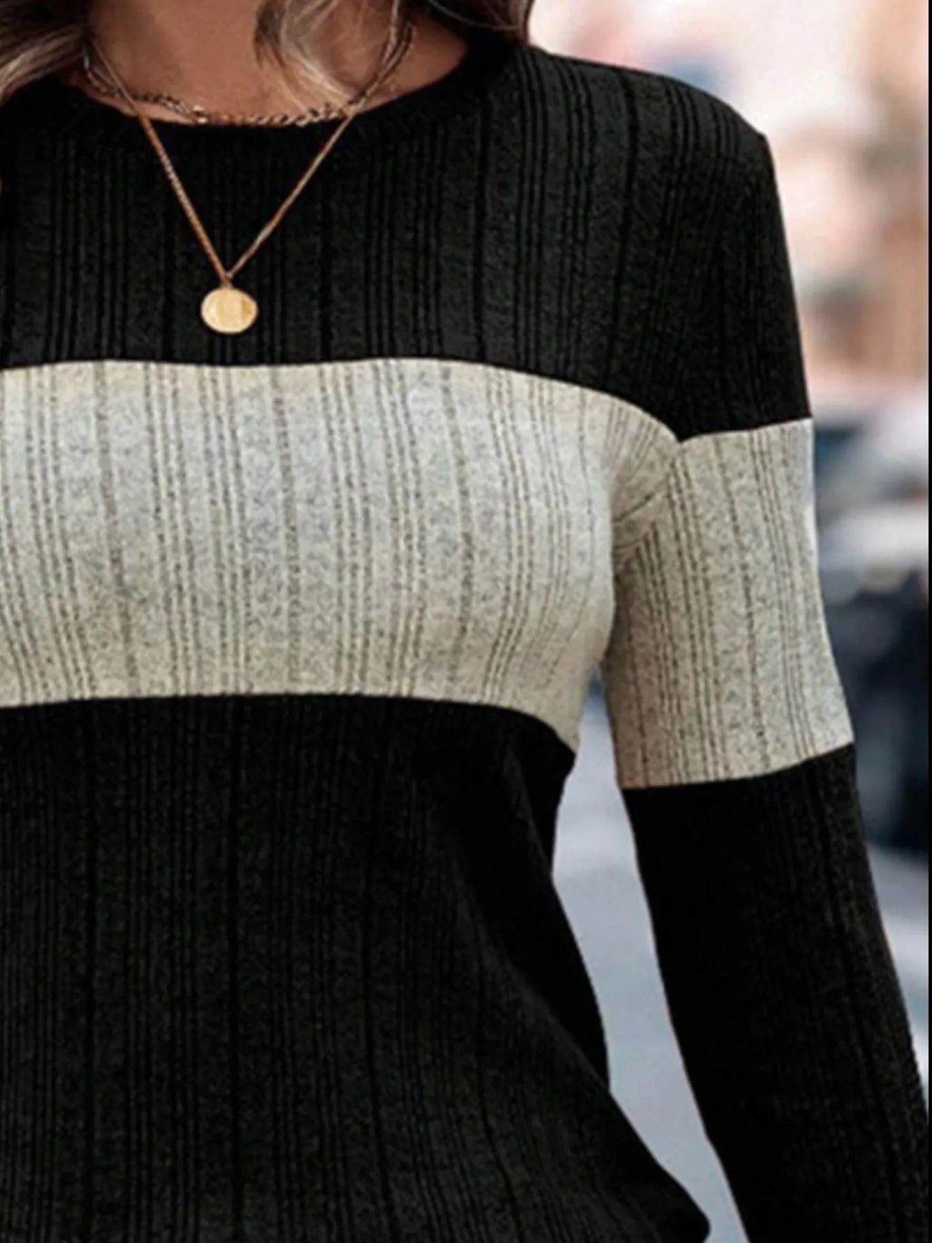 Black and heathered cream color-block long-sleeve knit sweater, ribbed knit