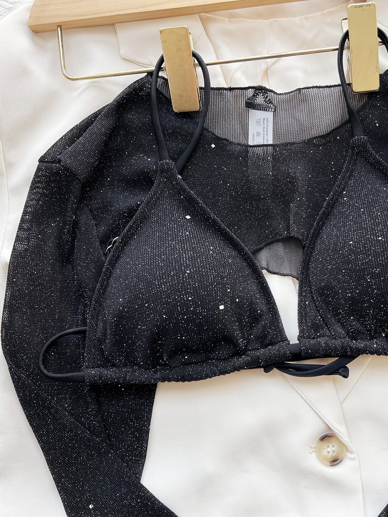 Black glitter triangle swim top with adjustable ties and matching high-leg bottoms