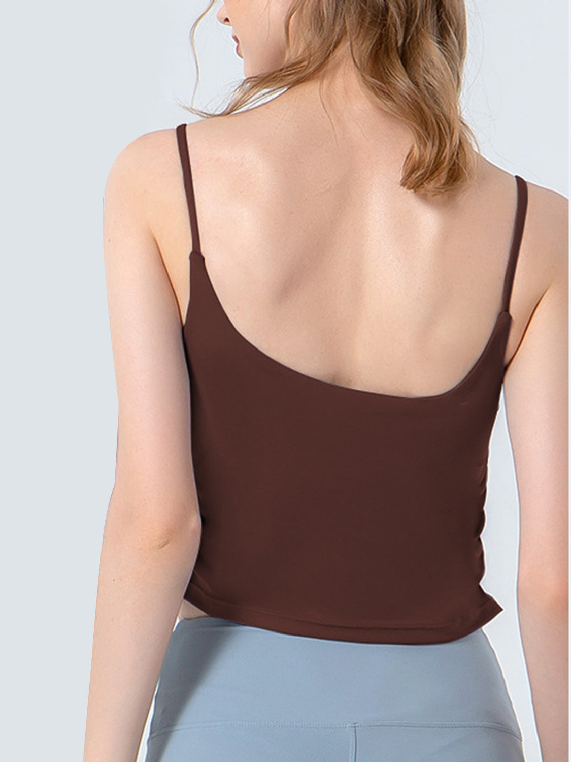 Brown ruched sports cami with low scoop back and spaghetti straps