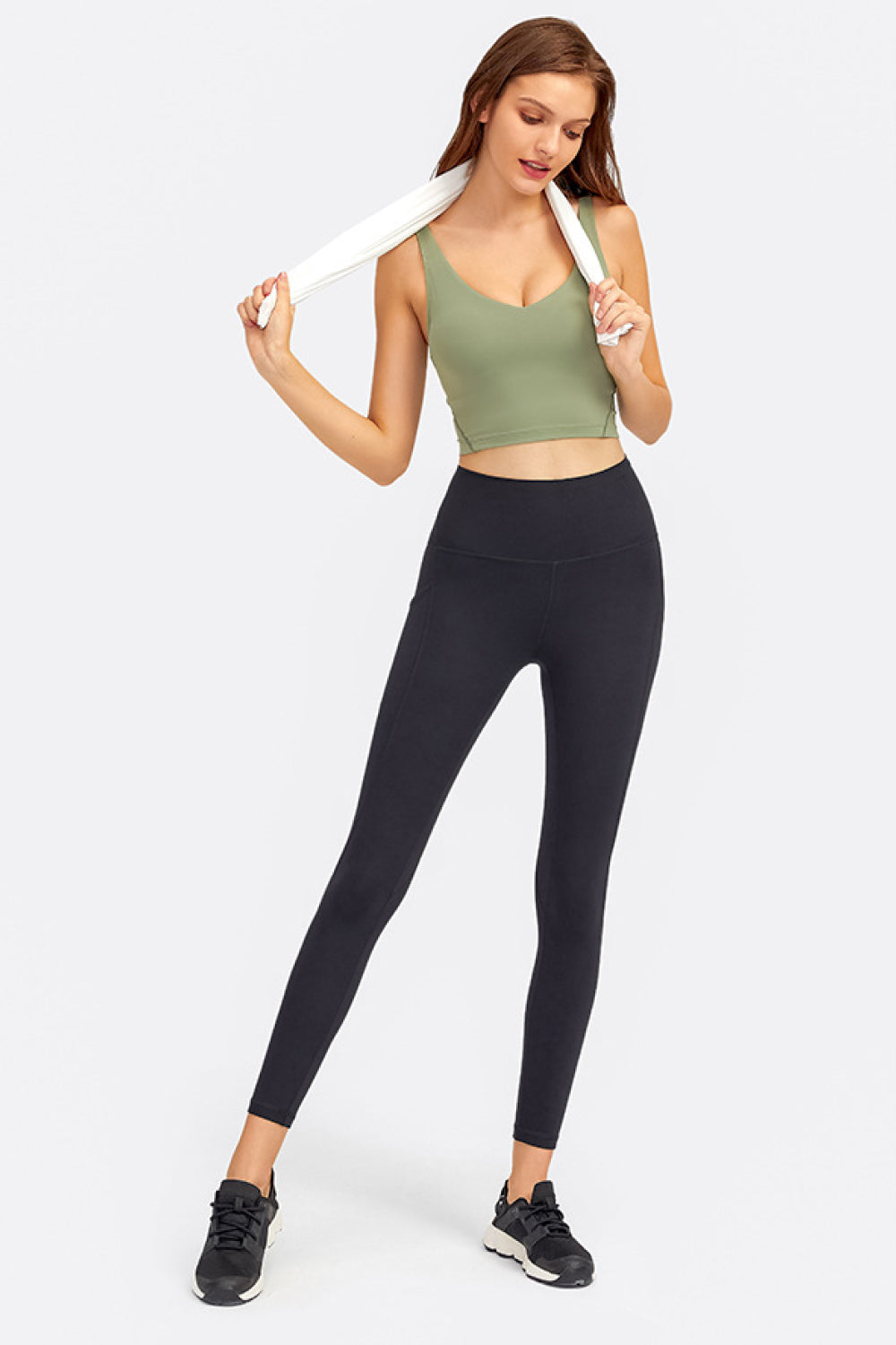 Green deep V-neck crop sports bra with supportive seams