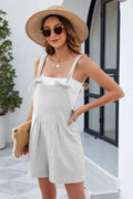 Light gray knotted-strap romper with pockets and square neckline