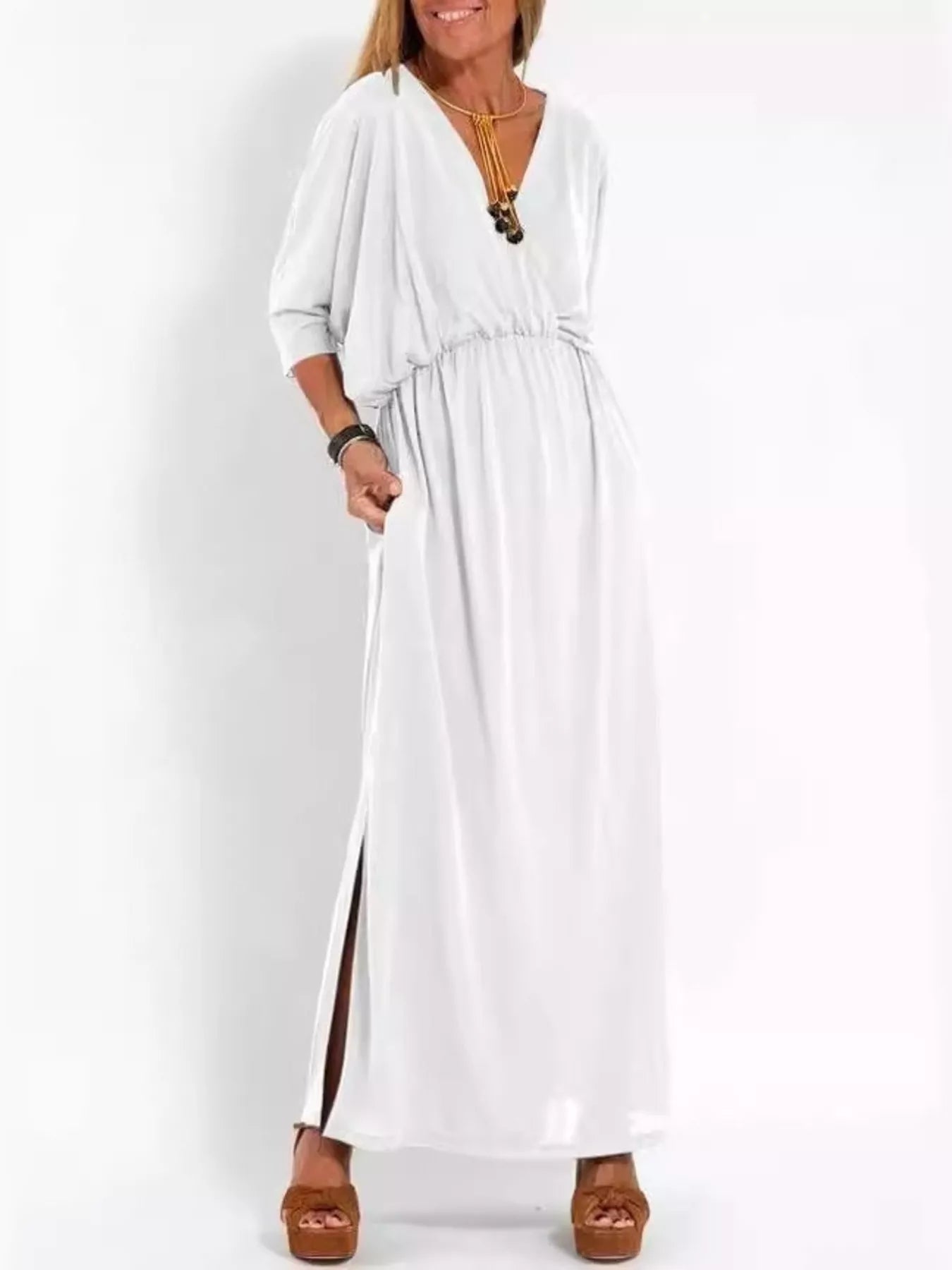 White V-neck batwing sleeve maxi dress with side slit and gathered waist