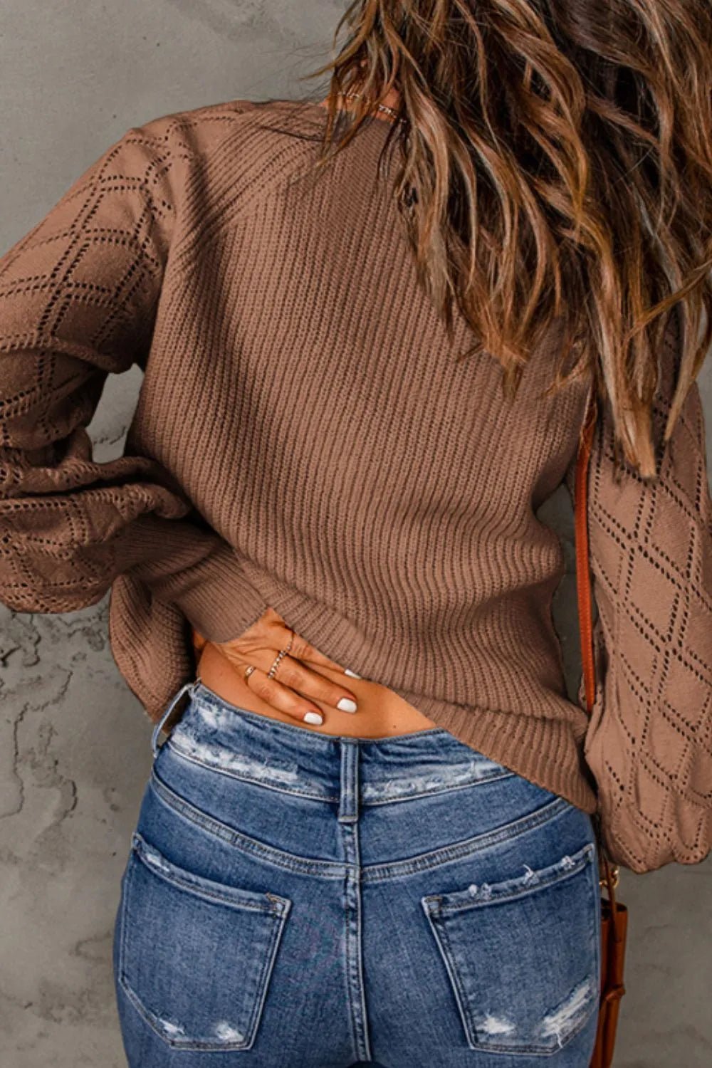 Taupe openwork knit V-neck cardigan with long balloon sleeves and ribbed waist hem detail