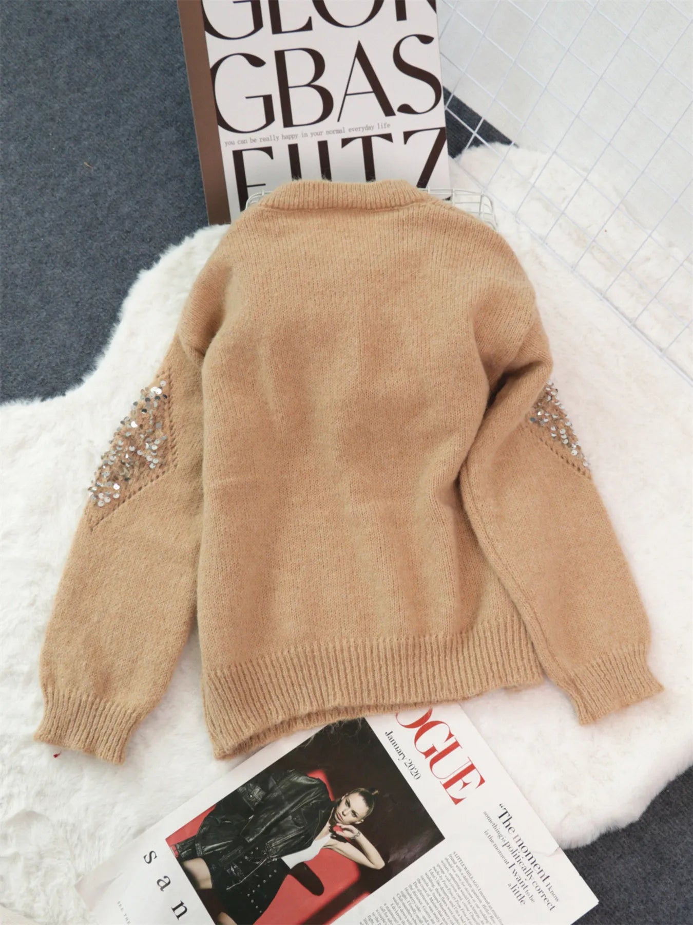 Khaki oversized sweater with sequin diamond detail on the shoulders