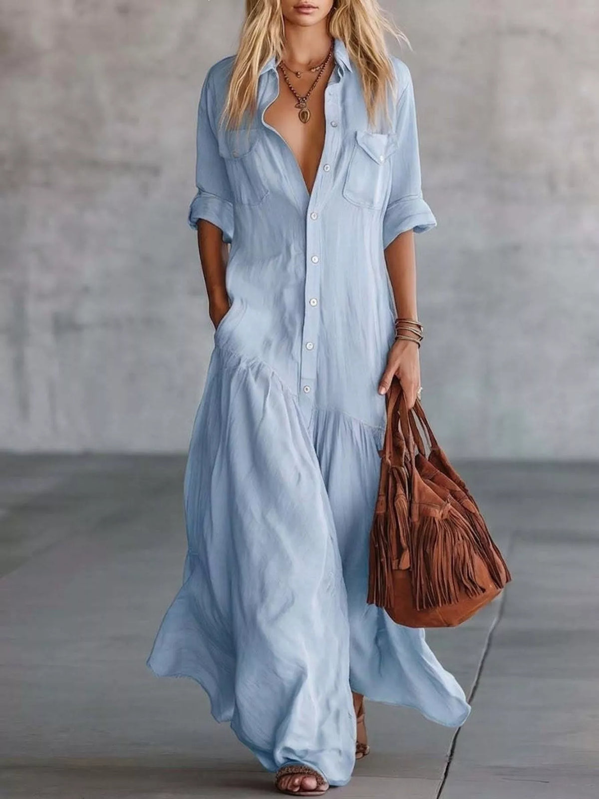 Light blue maxi shirt dress with button front, short sleeves, and side pockets