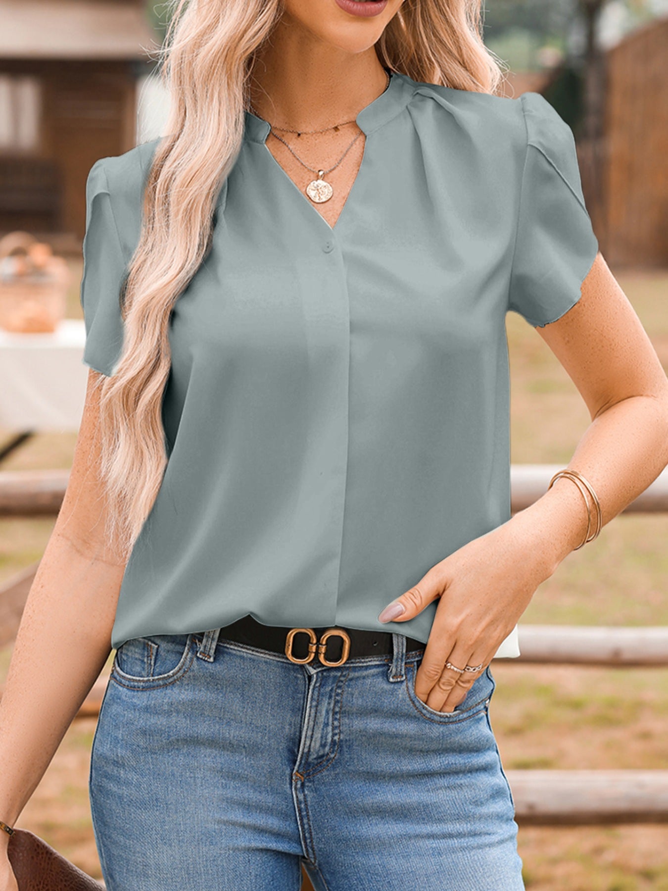 Trendsi Notched Neckline Petal Sleeve Blouse in light blue with short puff sleeves