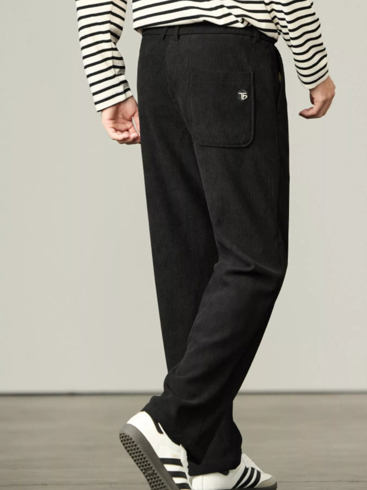 Black corduroy drawstring relaxed-fit pants with back patch pocket