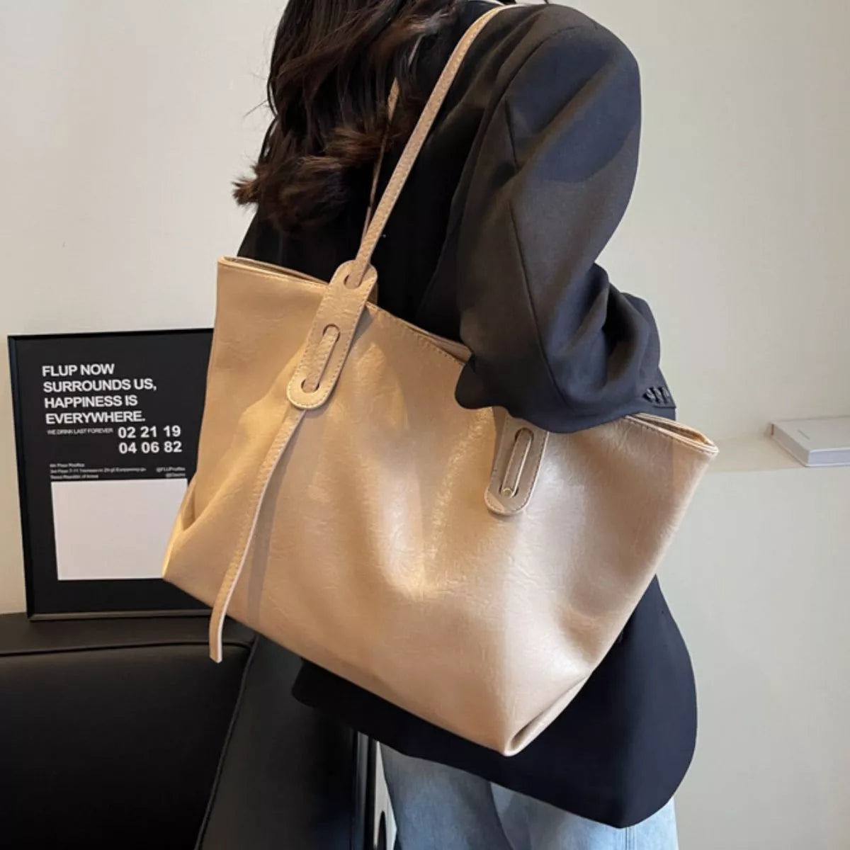 Khaki vegan leather shoulder bag tote with adjustable strap and front decorative pull tab