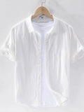 Men's short sleeve button-up shirt, white with front buttons and pointed collar