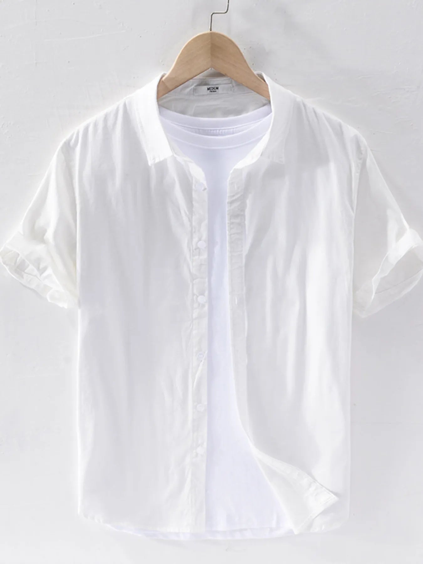 Men's short sleeve button-up shirt, white with front buttons and pointed collar