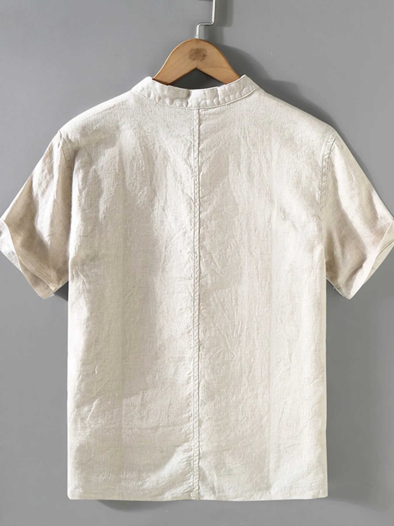 Light cream button-up short-sleeve shirt with band collar and center buttons