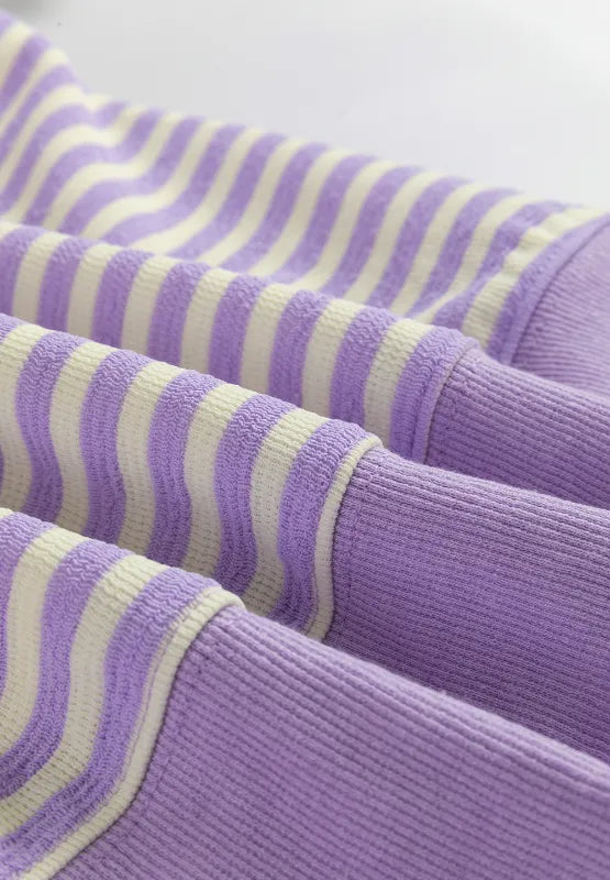 Lavender striped long-sleeve sweatshirt sleeve with ribbed cuff detail