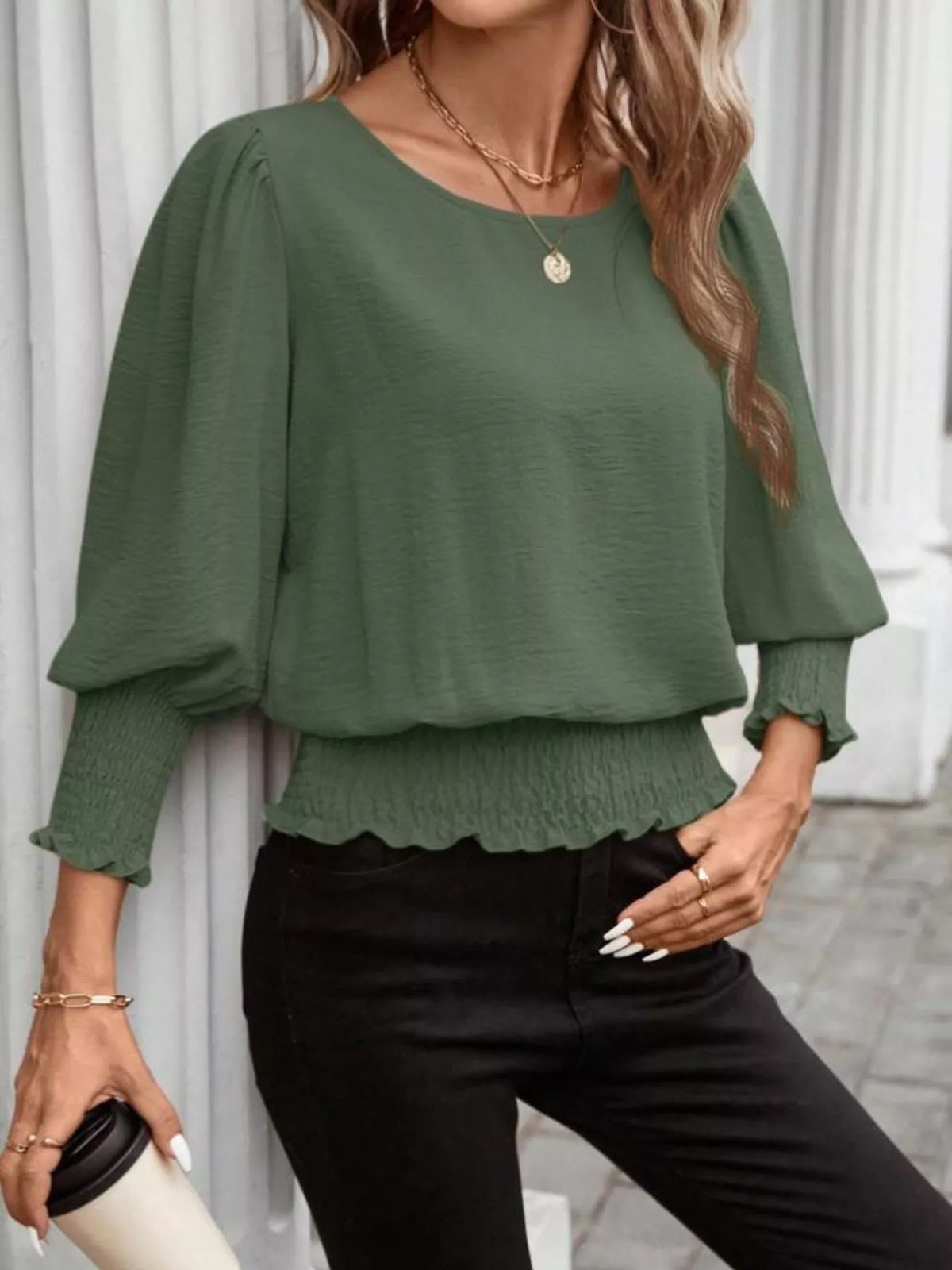 Dark green puff-sleeve smocked polyester blouse with elastic cuffs