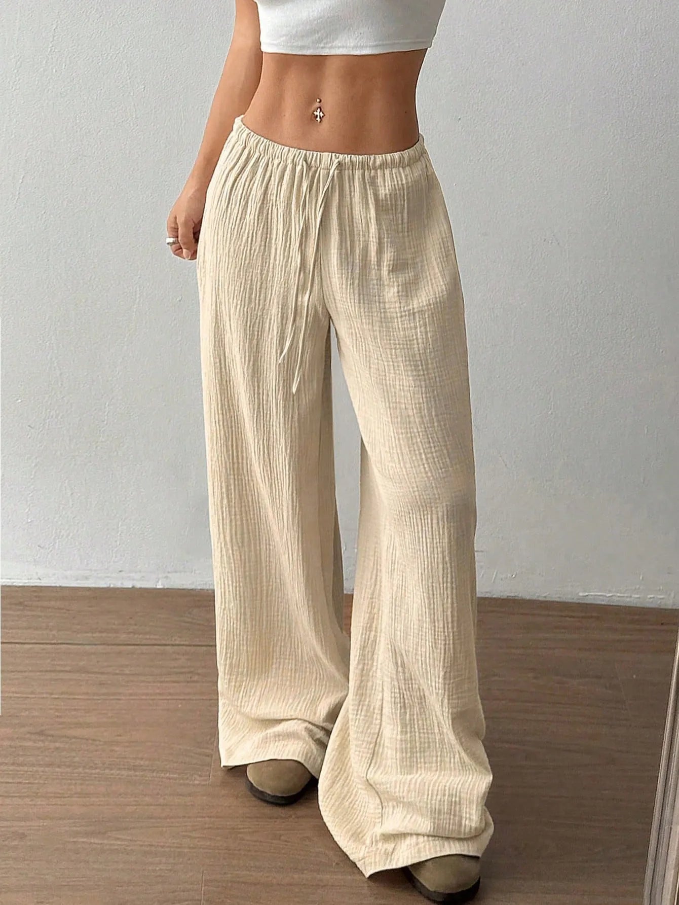 Light beige drawstring wide-leg casual pants with elastic waistband and roomy wide legs