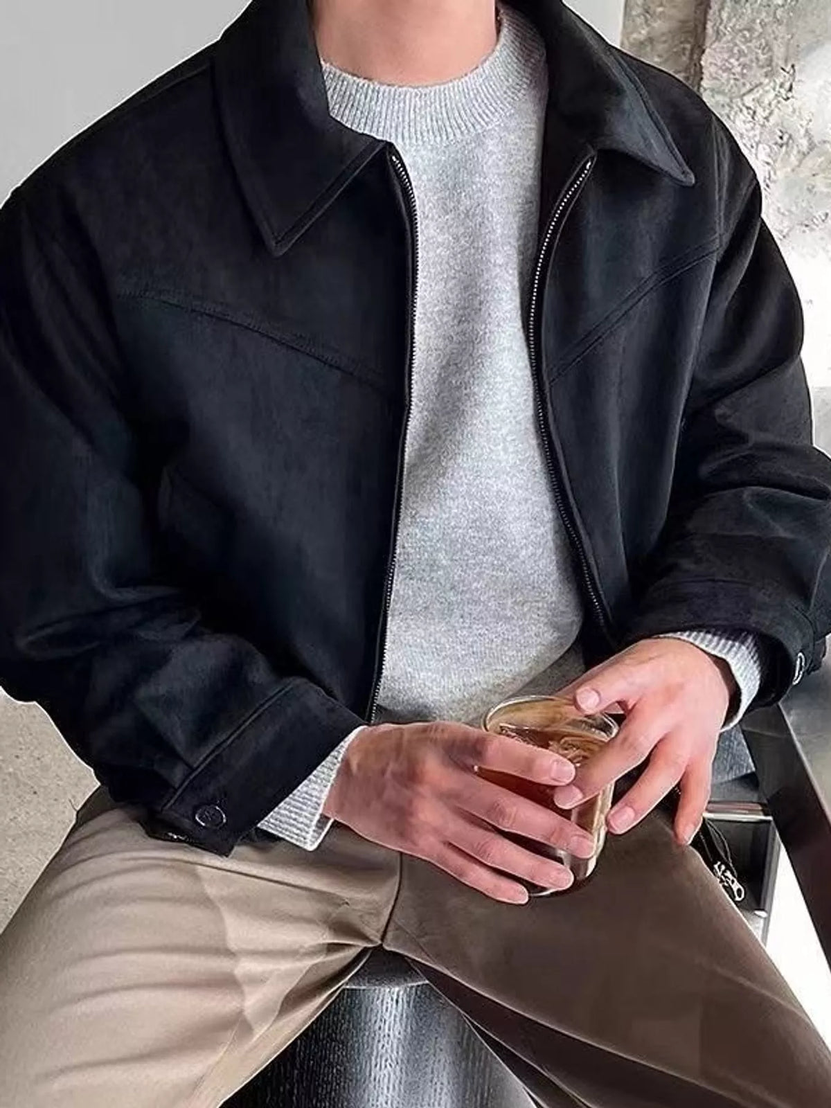 Black suede-style zip-up jacket with stand collar, front zipper, long sleeves