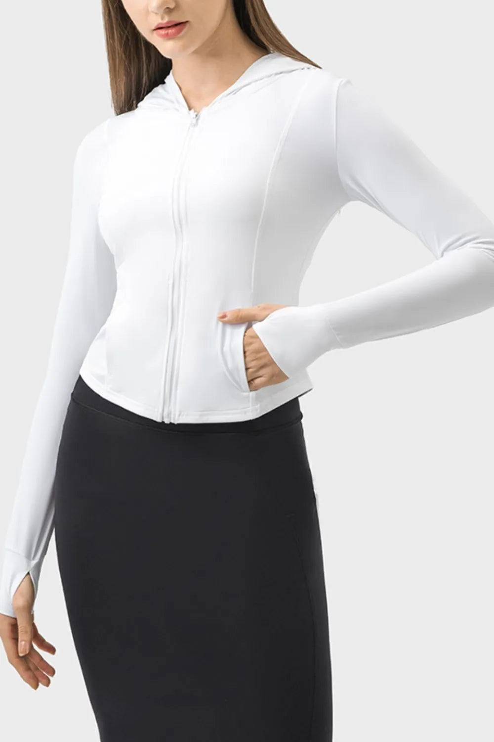 White zip-up hooded active jacket with long sleeves and front zipper