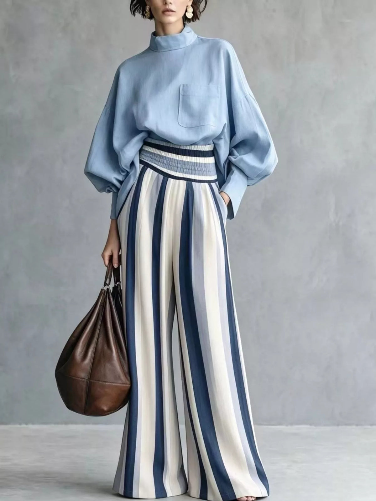 Light blue mock-neck top and vertically striped wide-leg pants two-piece set
