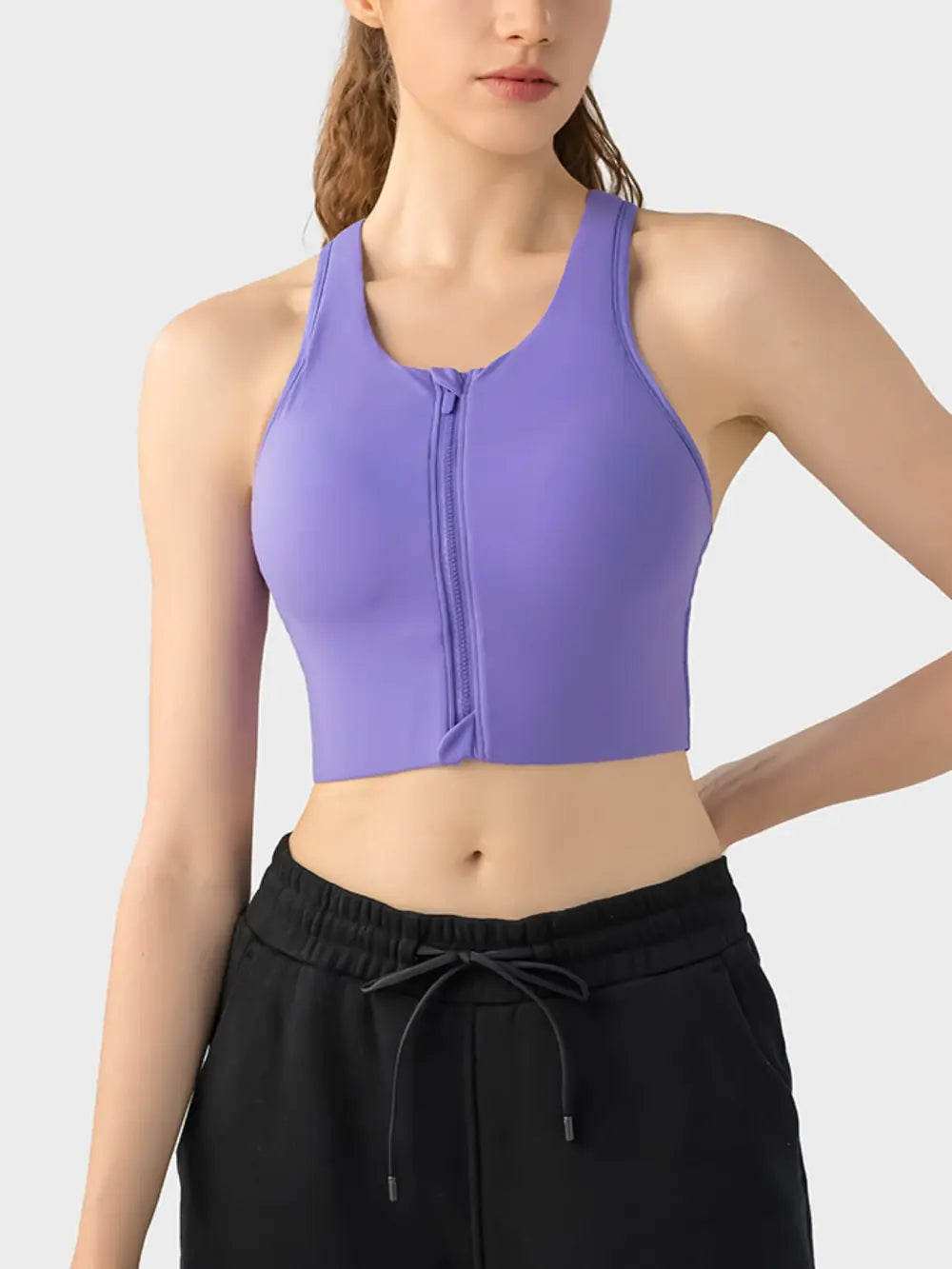 Purple wide-strap sport bra with front zipper and sleeveless racerback