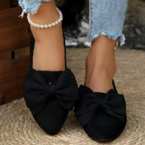 Black bow point-toe slip-on shoes with large front bow detailing