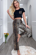 Black cropped T-shirt with leopard chest pocket and leopard print wide-leg pants