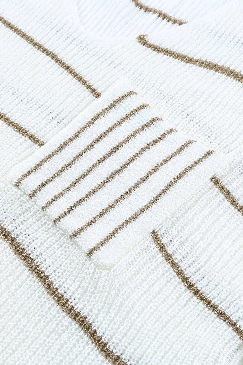 Close-up knit texture with diagonal and horizontal tan striped lines