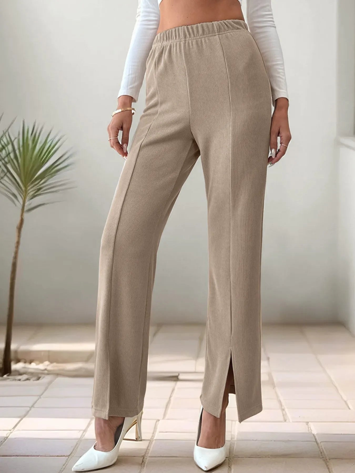 Khaki high-waisted wide-leg pants with elastic waistband and long front slit