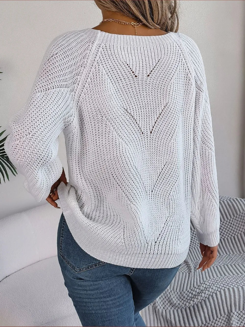 White openwork knit sweater back with diamond cable pattern and wide sleeves