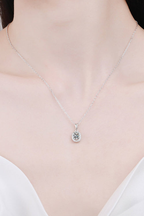 Silver chain necklace with small round moissanite pendant