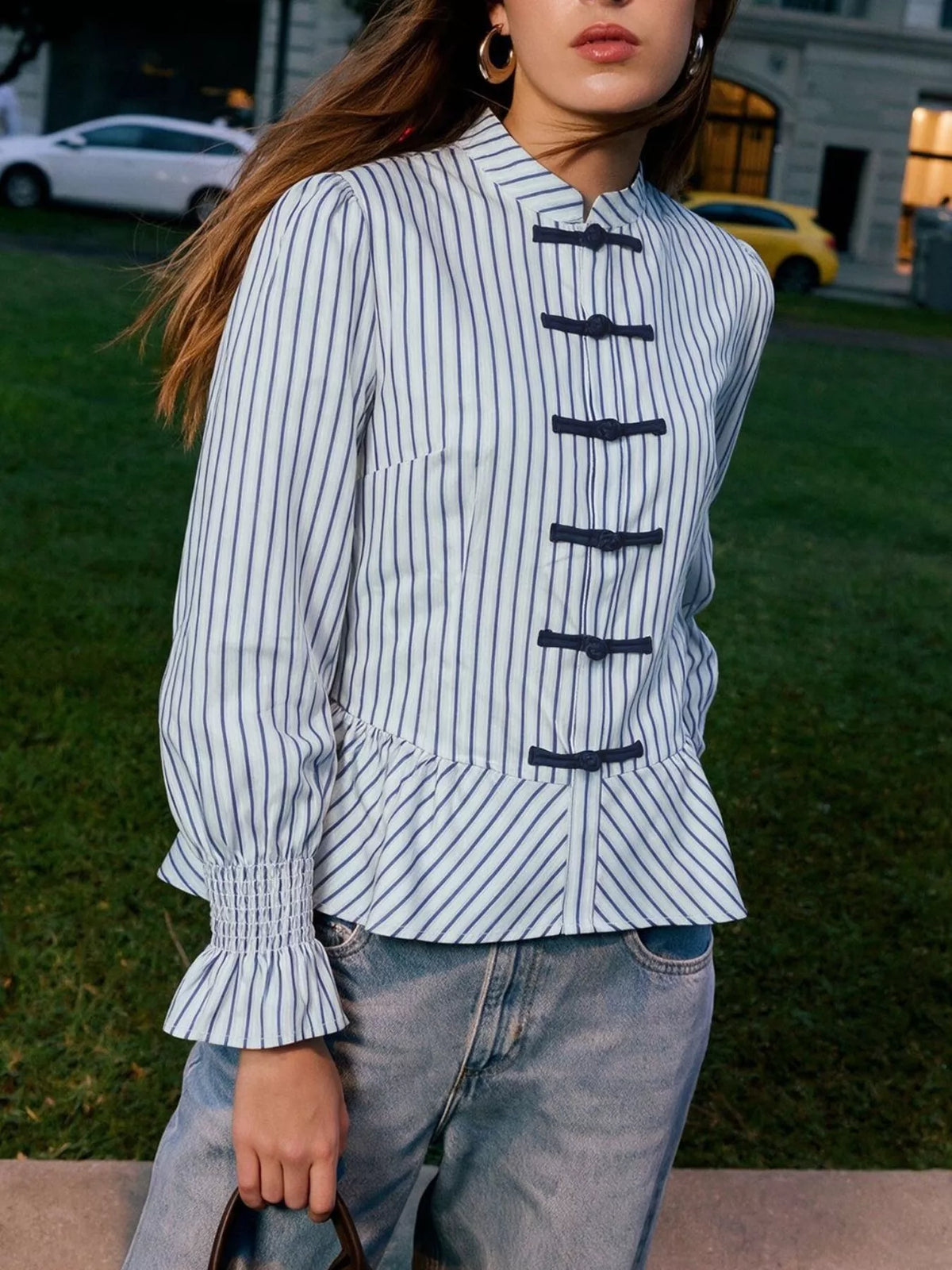 Womens striped mandarin peplum knot shirt with black toggle closure and gathered peplum hem
