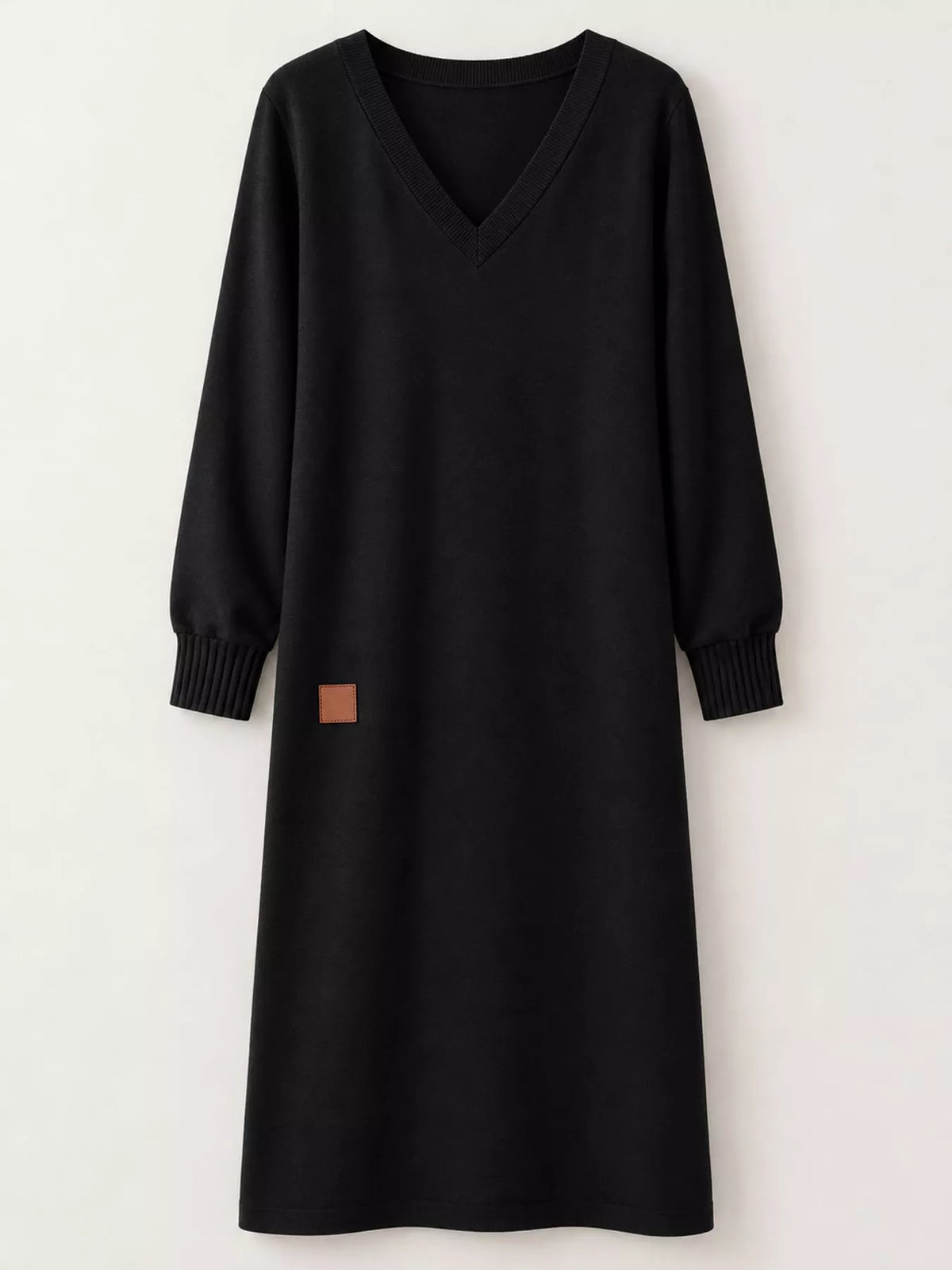 V-neck long-sleeve midi dress in black, front view with ribbed cuffs and patch