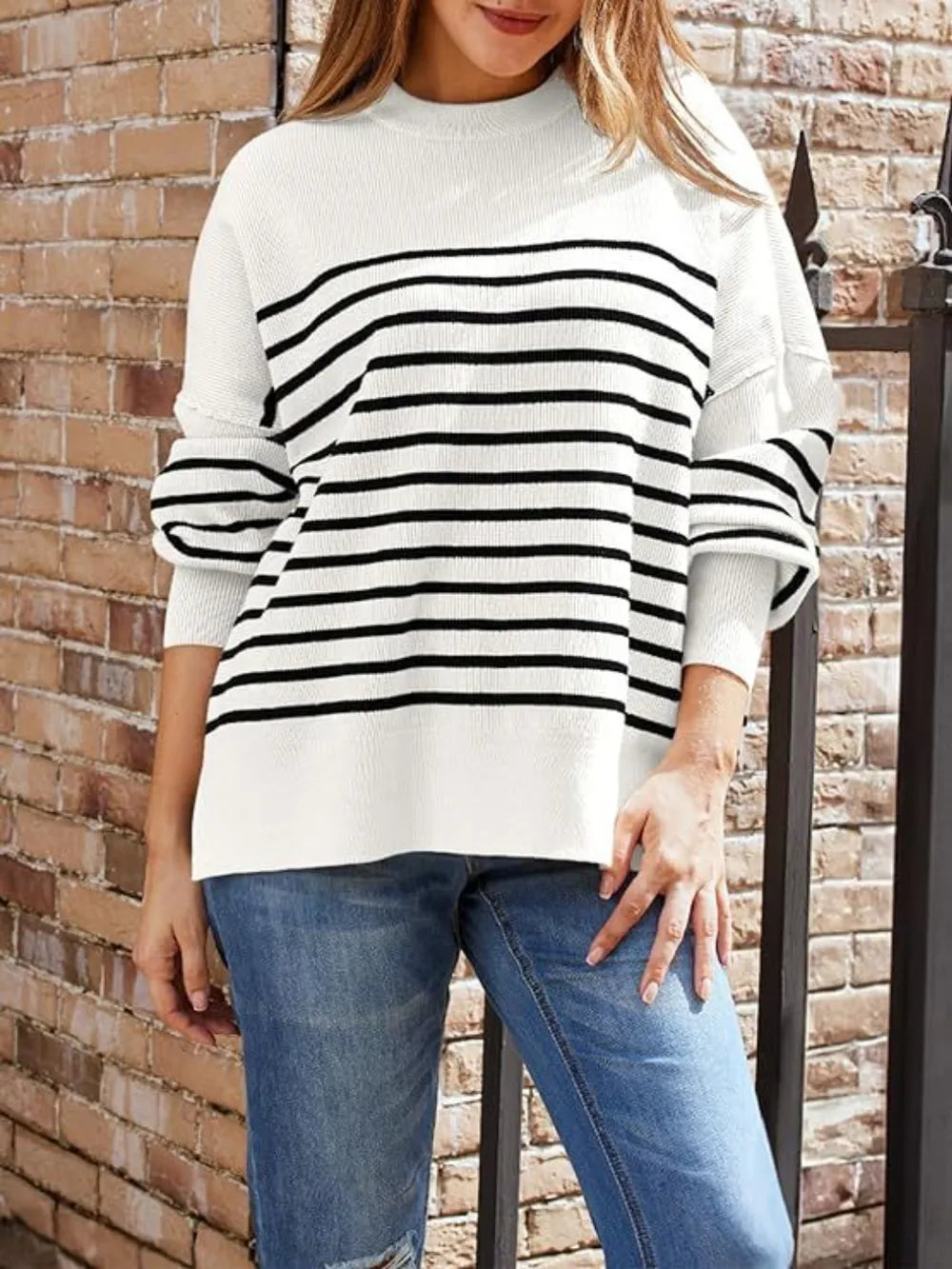 Tan long-sleeve sweatshirt with round neck and black horizontal stripe front