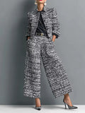 Black tweed cropped blazer and wide-leg pants set with ruffled sleeves