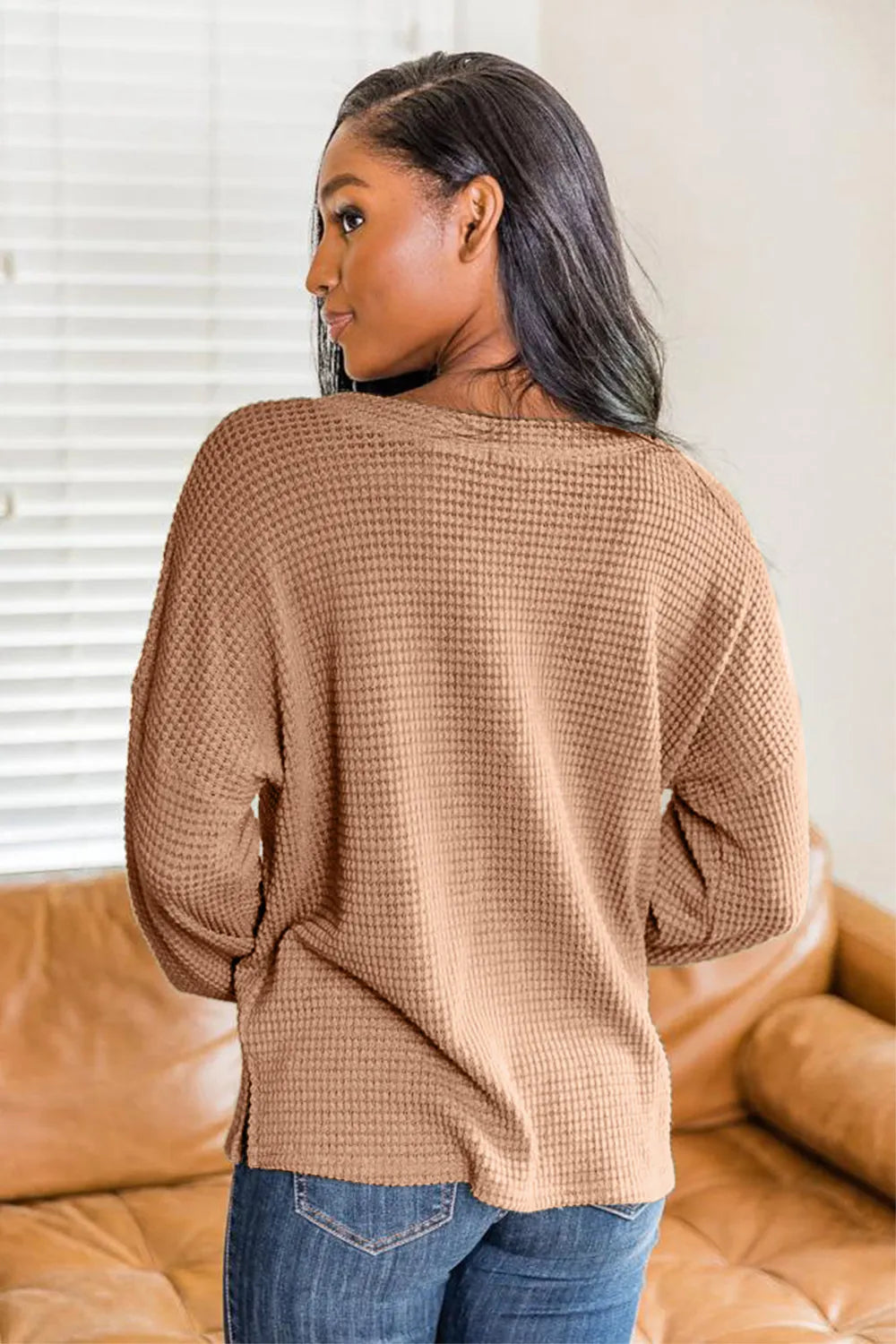 Camel waffle knit long sleeve henley top from back with waffle texture