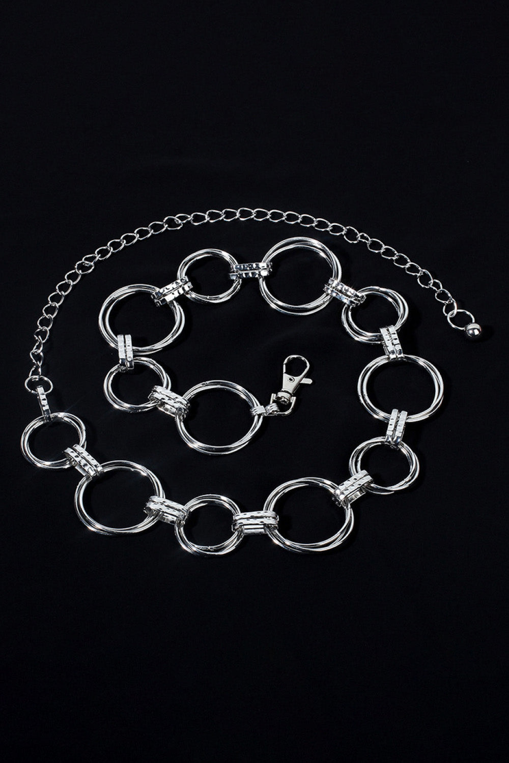 Silver alloy chain belt with linked ovals and round rings across the band
