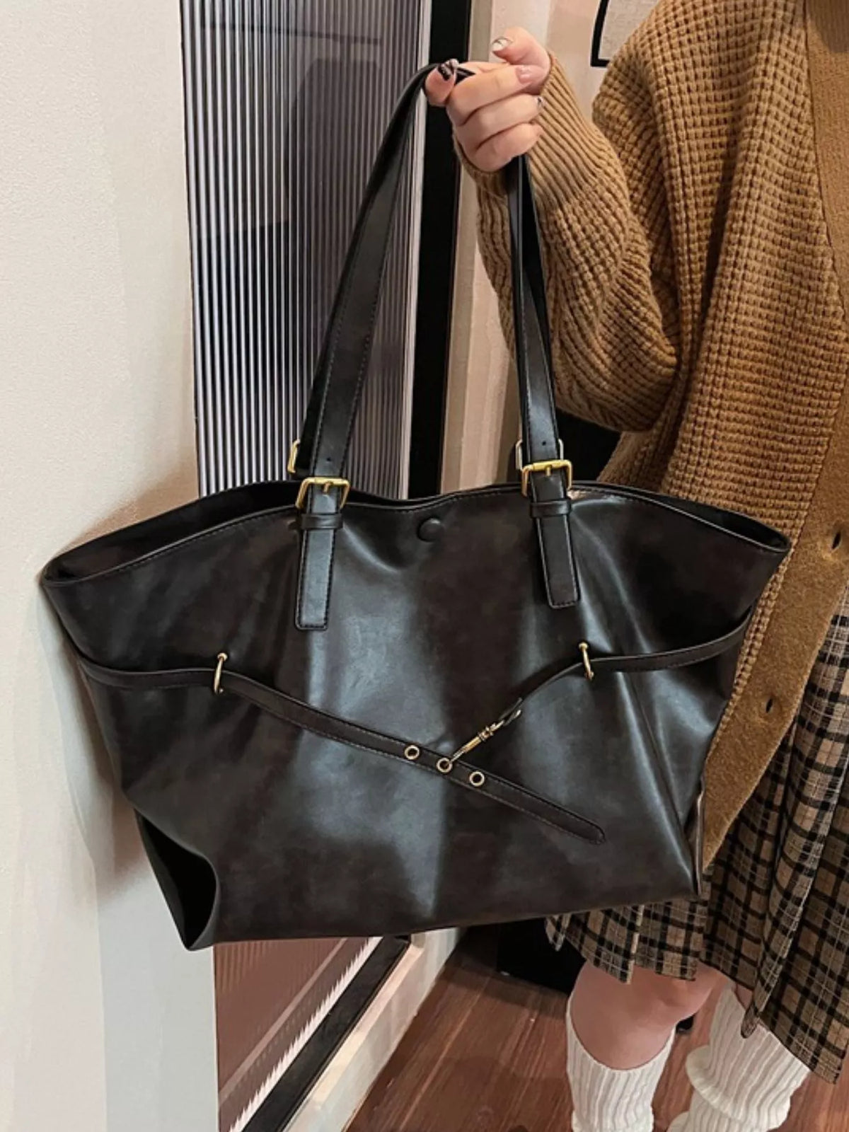 Large vegan leather tote bag, black, front panel with strap tabs and zipper pulls
