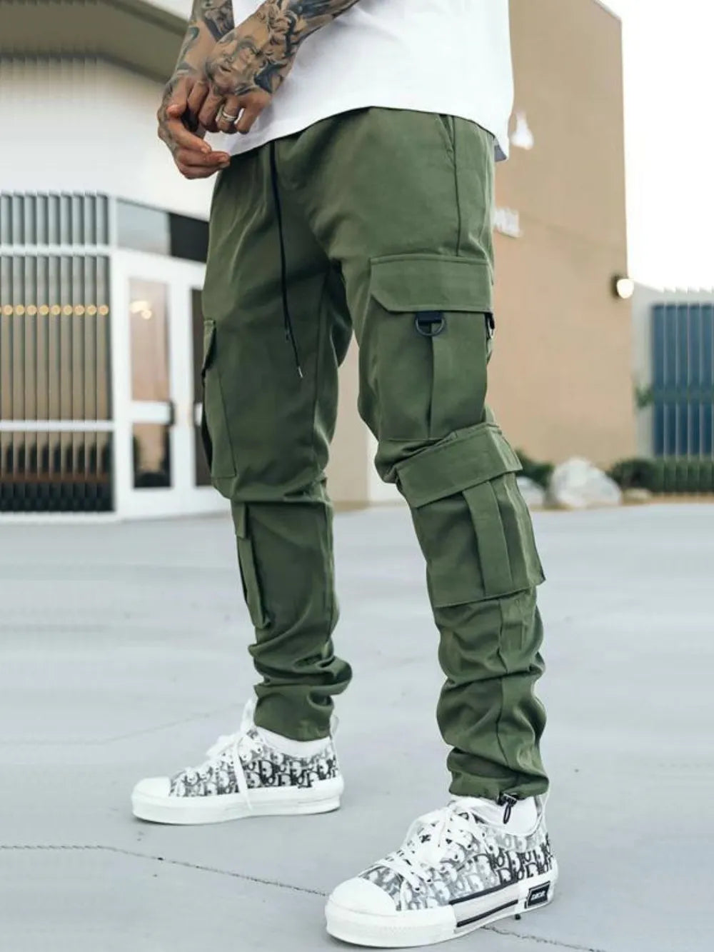 Men's army green drawstring cargo pants with flap cargo pocket and cuffed ankle