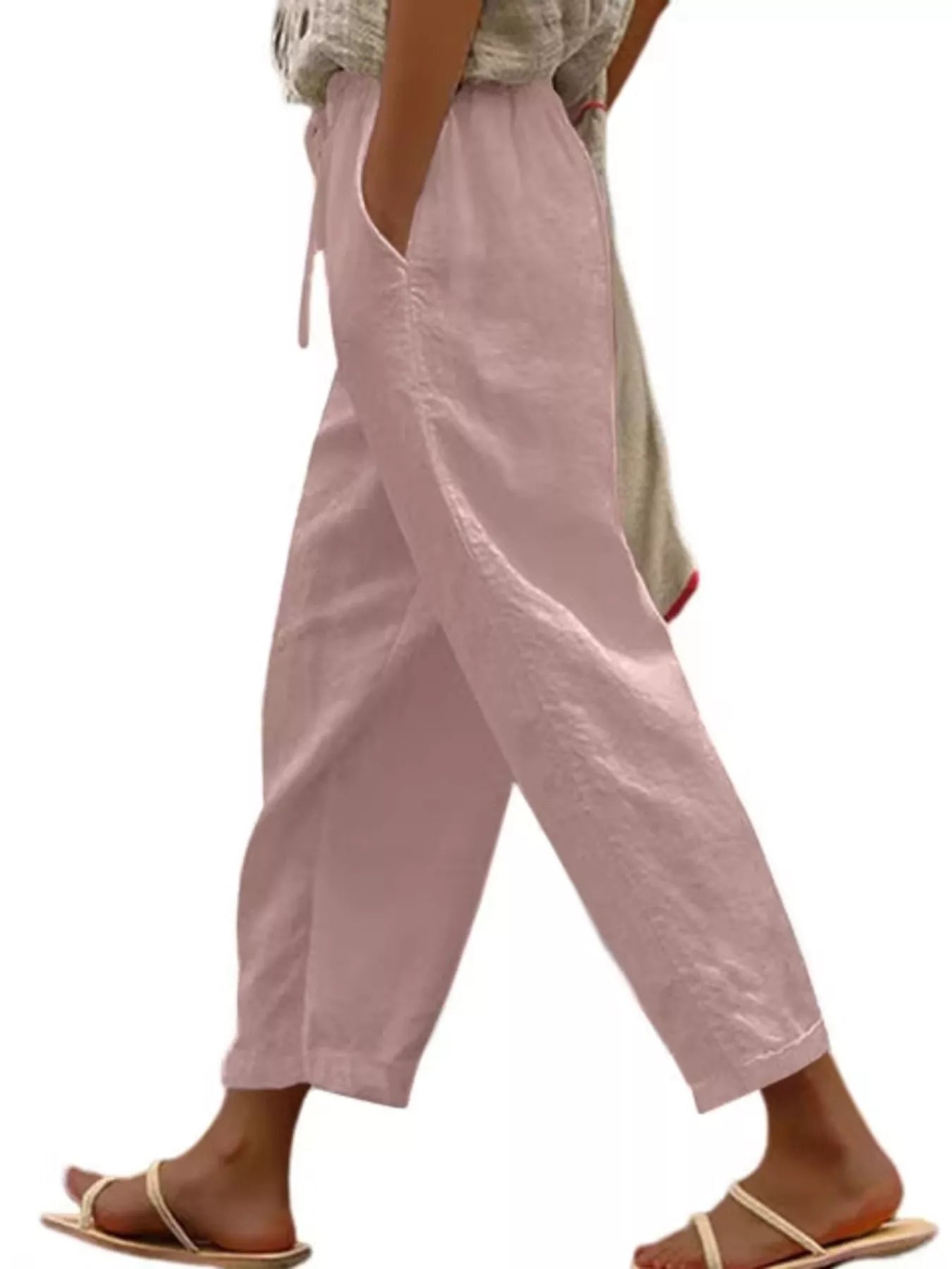 Dusty pink cropped drawstring pants with side pockets, relaxed wide-leg fit
