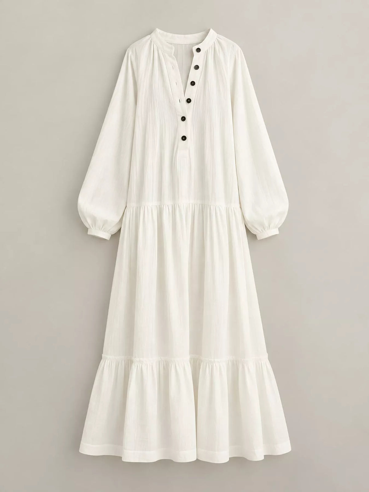 Ivory tiered button-front maxi dress with gathered waist and long puff sleeves