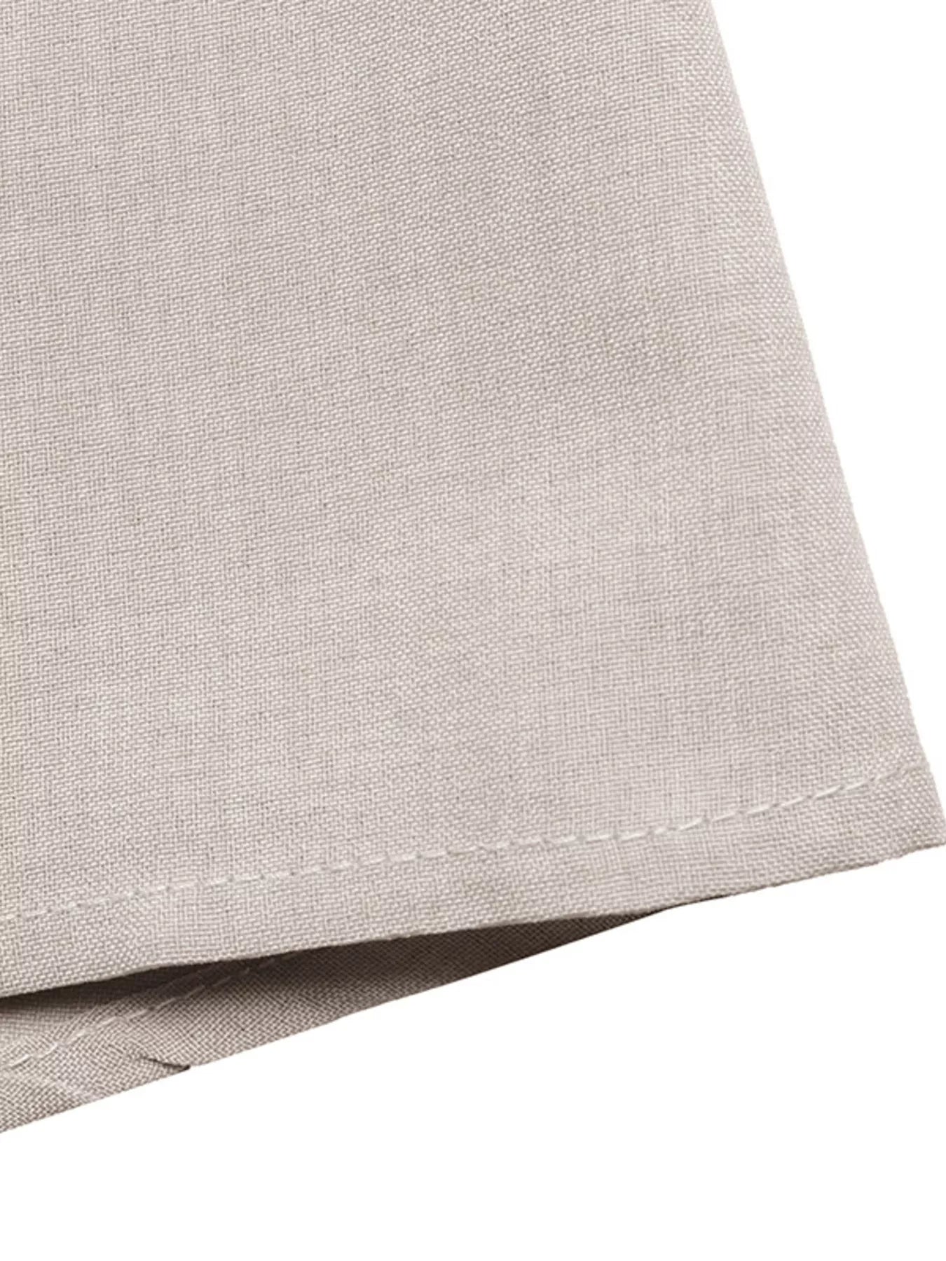 Cedar & Moore Sleeveless Button-Down Midi Dress in beige linen fabric close-up with hem