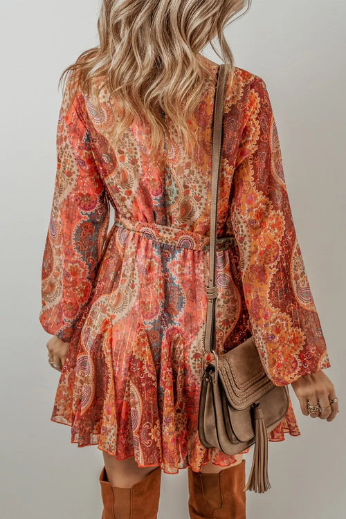 Paisley print long-sleeve mini dress, gathered waist, keyhole back with cross straps