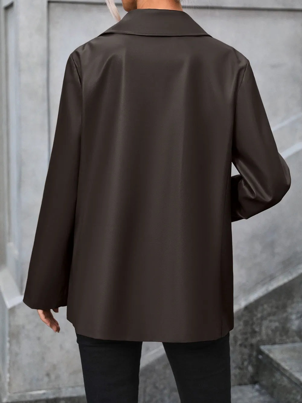 Dark button-up blazer back view with collared neckline and long sleeves