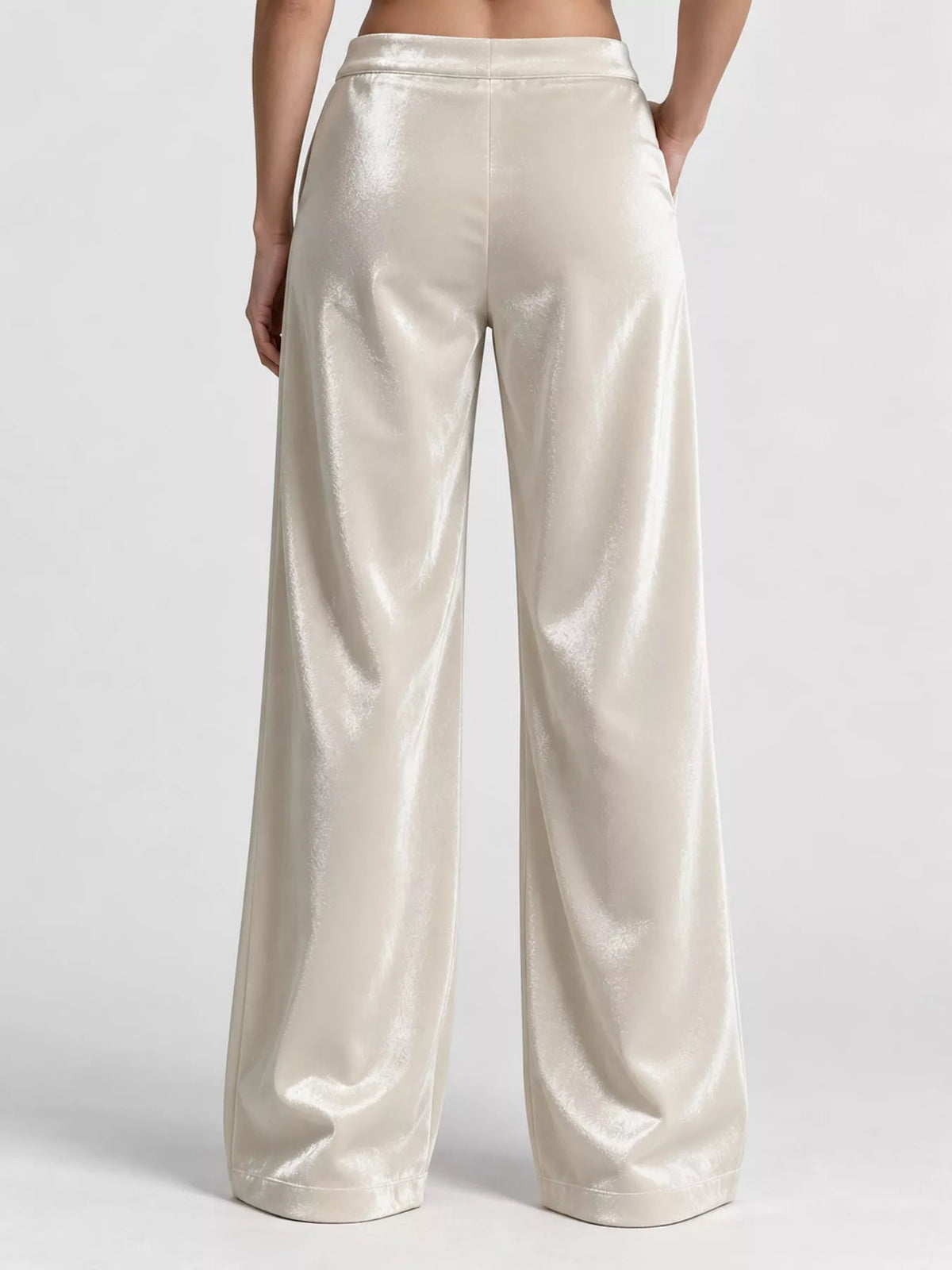 Off-white high-waisted velvet wide-leg pants with front pockets and straight center seam