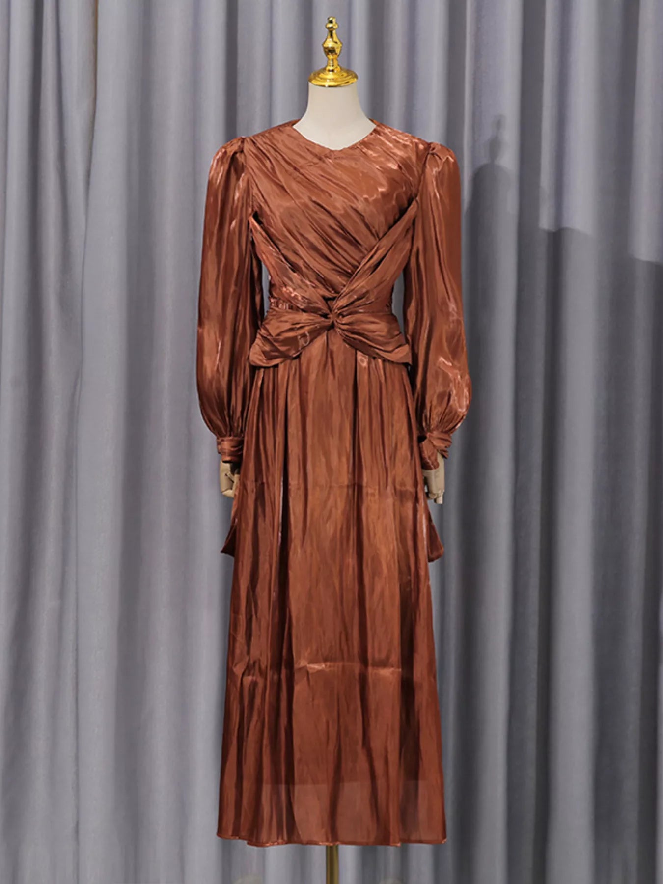 Cedar & Moore Front Twisted Draped Long Sleeve Maxi Dress in rust satin with knotted waist