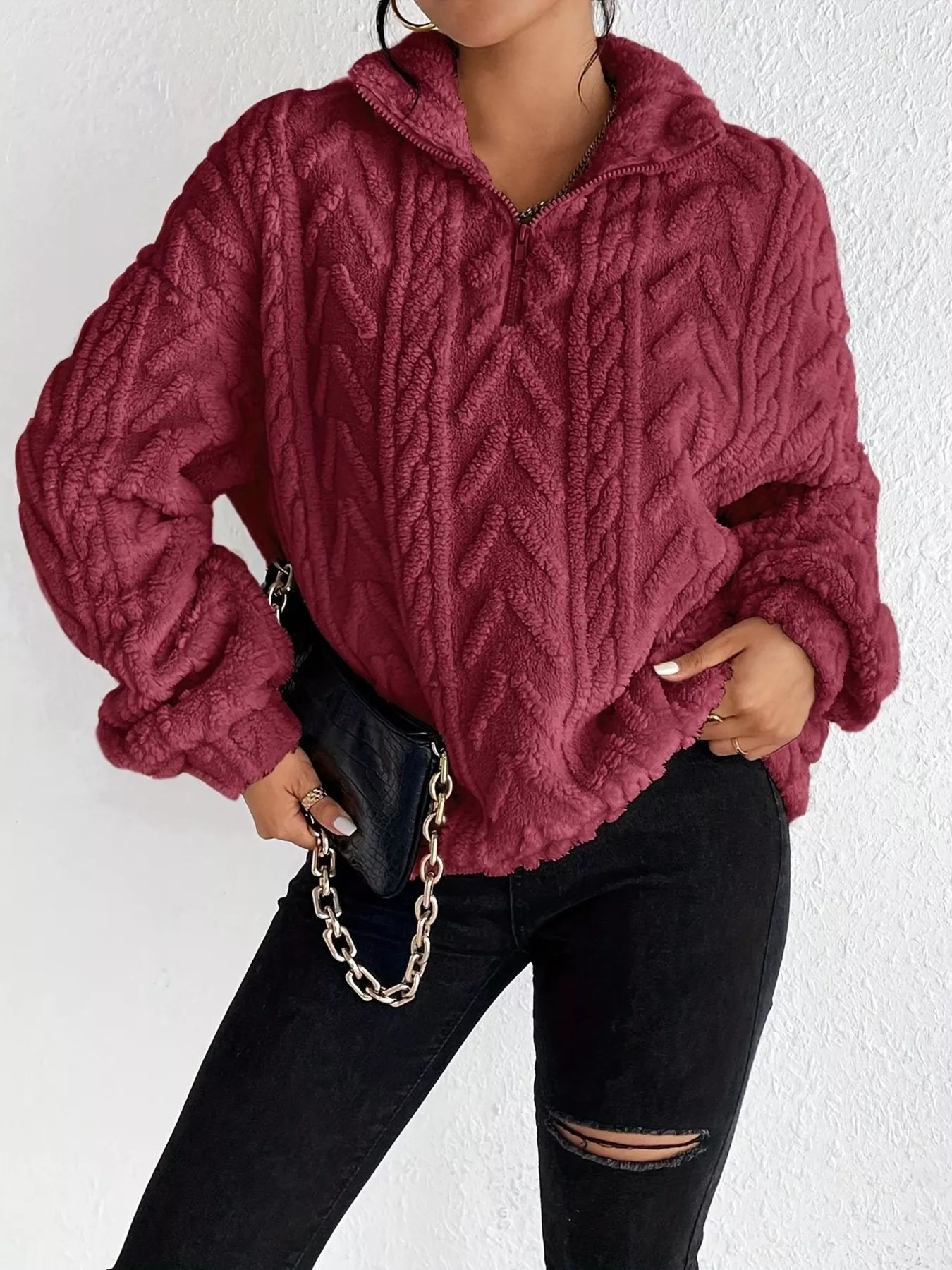 Sherpa quarter-zip sweatshirt, burgundy cable knit texture, dropped shoulders