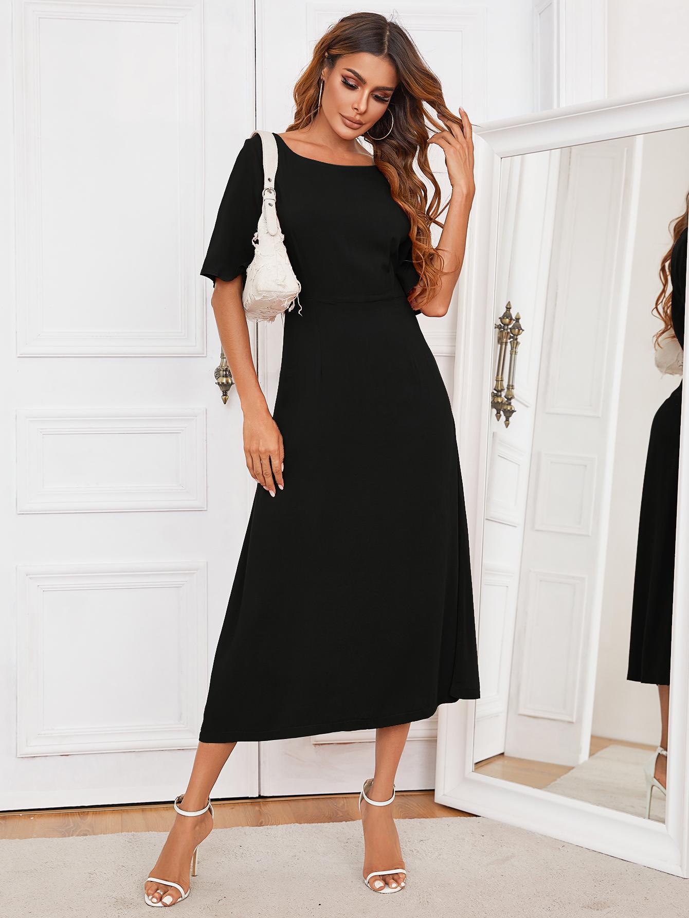 Black round-neck cutout half-sleeve midi dress, fitted waist and flared skirt