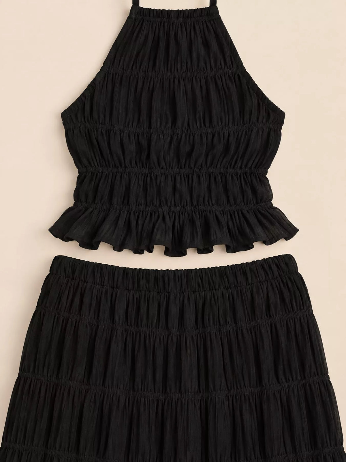 Black halter ruffle crop top and tiered maxi skirt set, smocked detail