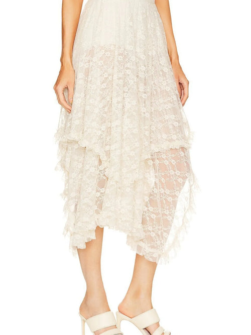 Milky white lace midi skirt with asymmetrical layers and ruffled hem