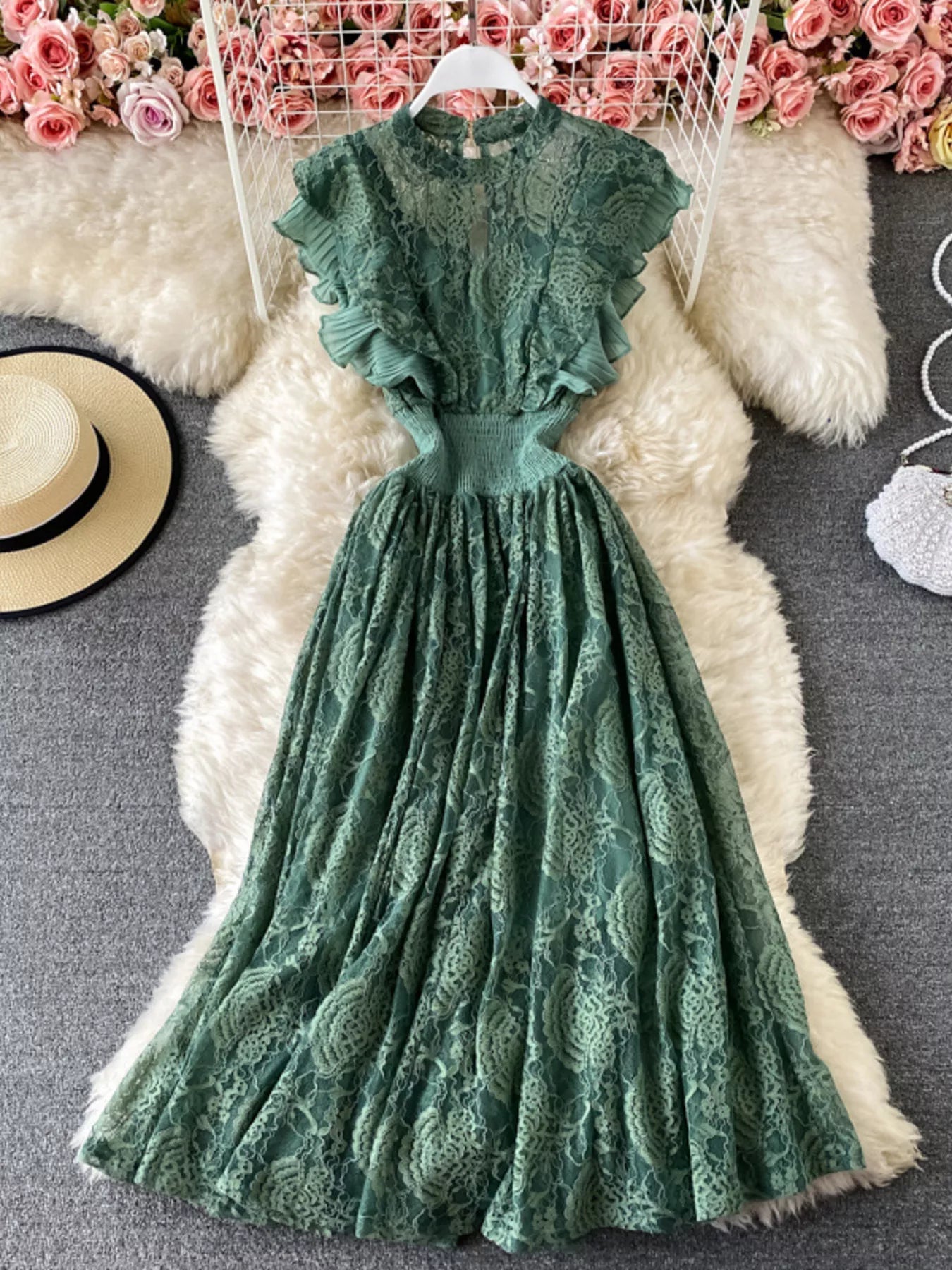 Cedar & Moore Ruffled Mock Neck Lace Maxi Dress in emerald green with a cinched waist and flutter sleeves