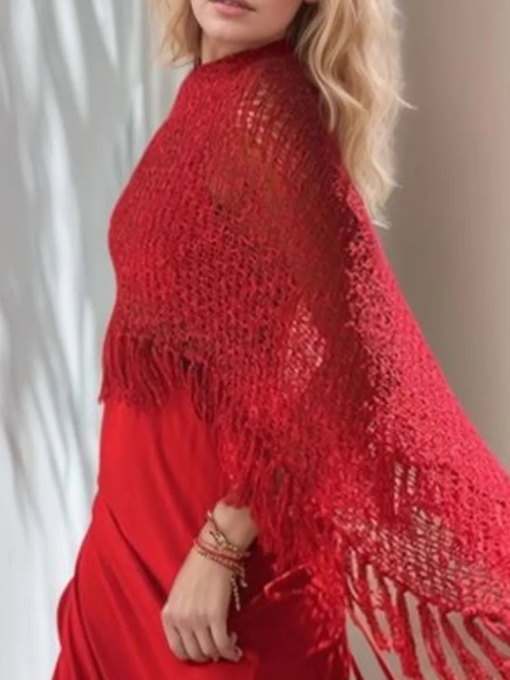 Red boat neck knit shawl with fringe tassels at hem and shoulder wrap